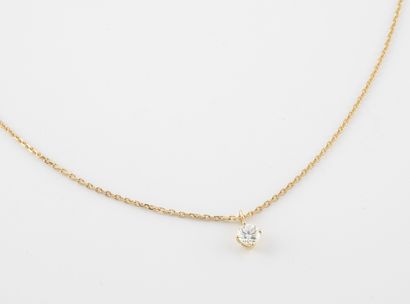 null Yellow gold (750) necklace with a yellow gold (750) pendant set with a 0.20...