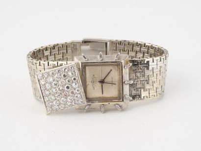 DICHIWATCH Montre bracelet de dame en or gris (750).

Boitier carré.

Lunette ponctuée...