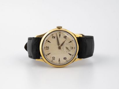 Men's wrist watch. 

Round case in yellow...
