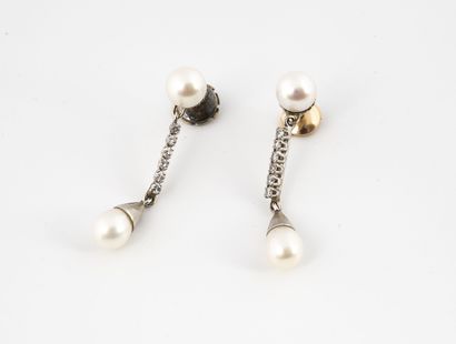 Pair of white gold (750) earrings with a...