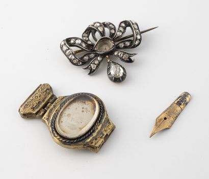 Yellow gold (585) and silver (800) bow brooch...