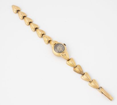 Lady's wristwatch in yellow gold (750).

Round...