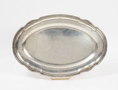 Caron Oval silver dish (950) with cut and molded edge with four leafy clasps, figured...