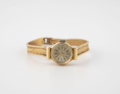 NOVOREX Lady's wristwatch in yellow gold (750).

Round case.

Dial with satin-finish...