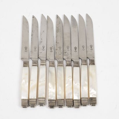 Nine cheese knives with white mother-of-pearl...