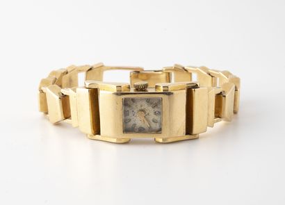 LIP Ladies' wristwatch. 

Rectangular case in yellow gold (750). 

Dial with champagne...