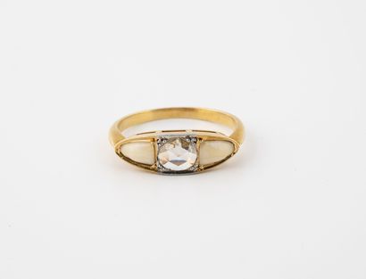 Yellow gold (750) navette ring centered on...