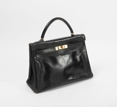 HERMES PARIS - MADE IN FRANCE Kelly bag 32 cm version returned in black box calf.

Inside...
