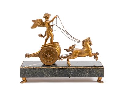 null Clock with the chariot of Love, drawn by two impetuous horses, in gilded bronze,...