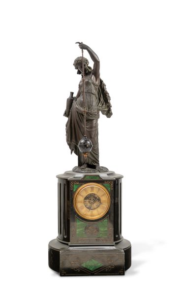  Monumental clock, called "mysterious", formed of a standing woman, draped in the...