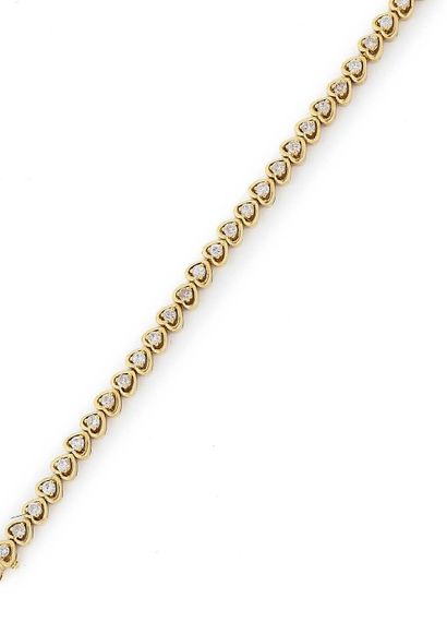 Bracelet ligne en or jaune (750) formé de...