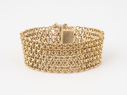 Bracelet with interlaced mesh in yellow gold...