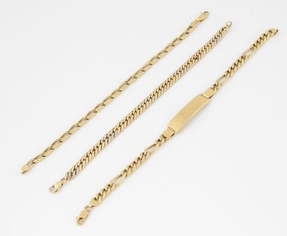 null Lot of three bracelets in yellow gold (750), one with a filed gourmette link,...