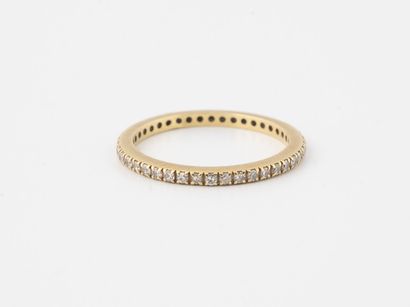 null Small American wedding band in yellow gold (750) set with small brilliant-cut...