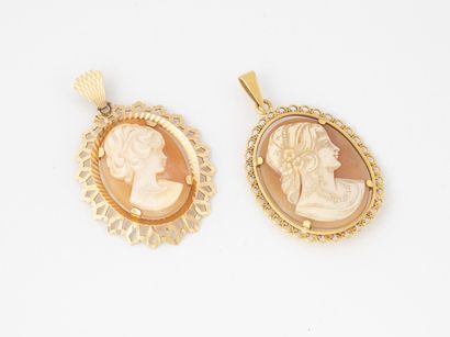 Two pendants holding cameos on shells decorated...