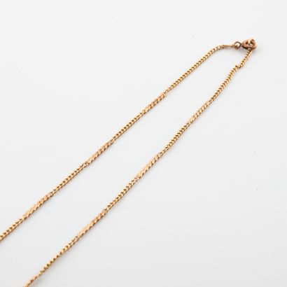 null Necklace in yellow gold (750) with articulated curb chain and rigid links. 

Spring...