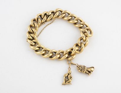 null Hollow gourmette link bracelet in yellow gold (750) holding two pendants in...