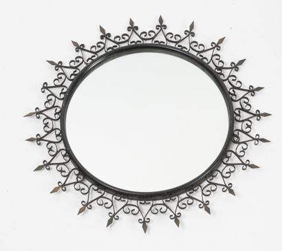CHATY, Vallauris Sun mirror.

In black and gold patinated metal.

Mark on the back...