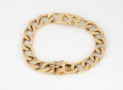 null Bracelet à maille gourmette limée en or jaune (750), chiffrée C.R. 

Fermoir...