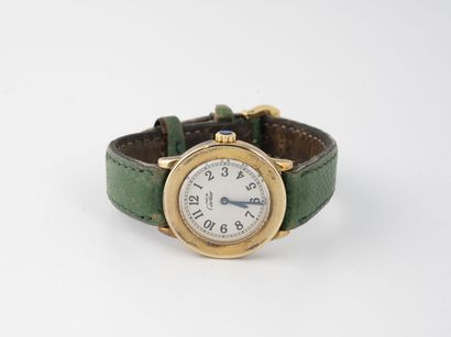CARTIER, MUST Lady's wrist watch.

Round case in silver gilt (925).

Dial with white...