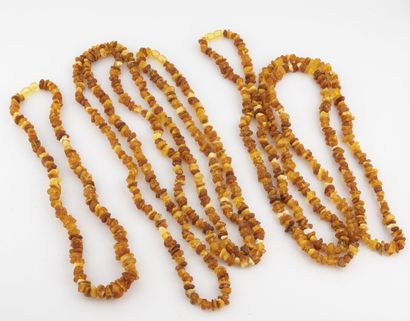Lot of two necklaces and a necklace in amber...