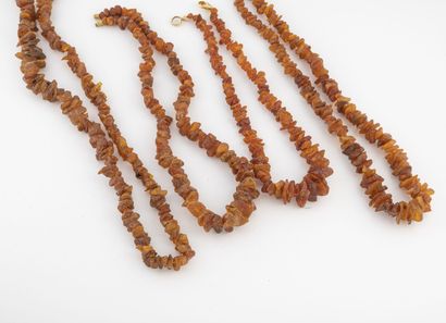 null Lot of three necklaces of brown amber pucks in fall and a necklace.

Two with...