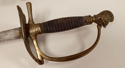 FRANCE ou AFRIQUE Two swords:

- one of uniform.

Gold-plated brass hilt with one...