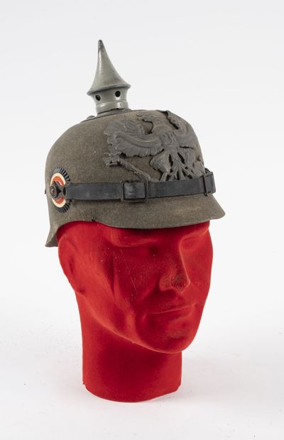 null Helmet with point model 1915 ersatz manufacture out of green felt.

Parts a...