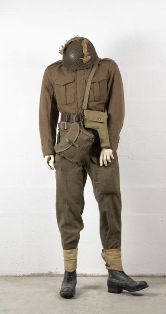 null Paratrooper mannequin including:

British woolen Battle Dress (jacket and pants),...