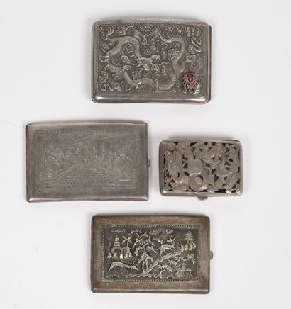 null Lot of 4 cigarette cases in chased or openwork metal, Indochinese work with...
