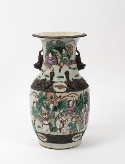 CHINE, XIXème-XXème siècles Vase in baluster out of ceramics with polychrome decoration...