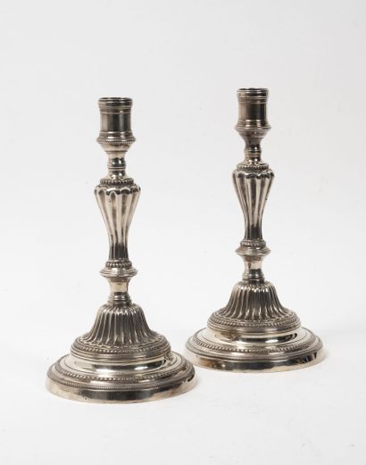 FRANCE, XIXEME SIECLE 
Six silver plated brass torches with inverted baluster shafts:




-...