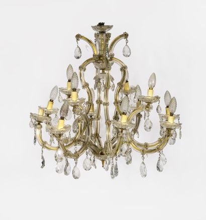 MURANO, XXème siècle Brass chandelier with two crowns of eight and four lights, decorated...