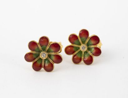 null Pair of yellow gold (750) stud earrings with flower motifs, the petals enamelled...