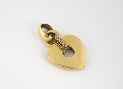 null Hollow pendant in yellow gold (750) in the shape of heart pierced in its center.

Weight...