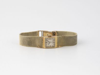 NIVADA Montre bracelet de dame en or jaune (585).

Cadran carré à fond ivoire, index...