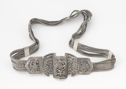 Silver belt (800) made of four strands of...