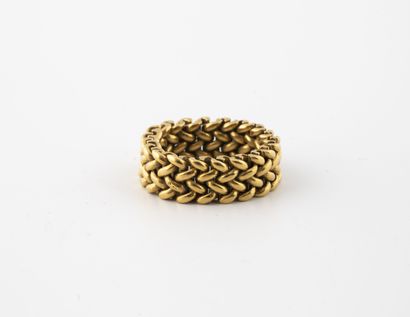 null Yellow gold (750) ring with braided mesh. 

Weight : 11,0 g. - Finger size :...