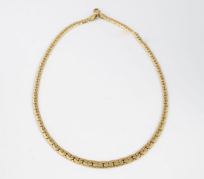 null Necklace with flattened curb chain in yellow gold (750). 

Clasp snap hook.

Weight...