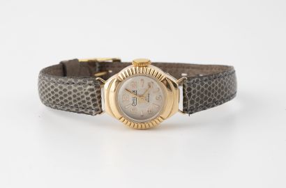 CHILEX Lady's wrist watch. 

Round case in yellow gold (750). 

Dial with white background,...