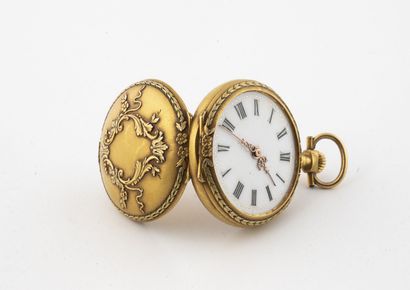 null Yellow gold (750) collar watch. 

Back cover with repoussé decoration of a medallion...