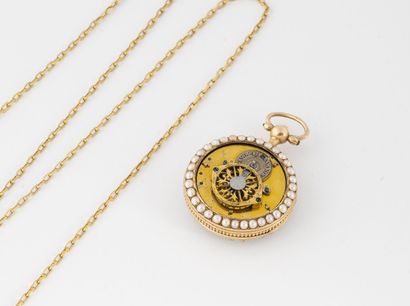 null Deux bijoux en or jaune (750) :

- montre de col.

Cadran à fond blanc, index...