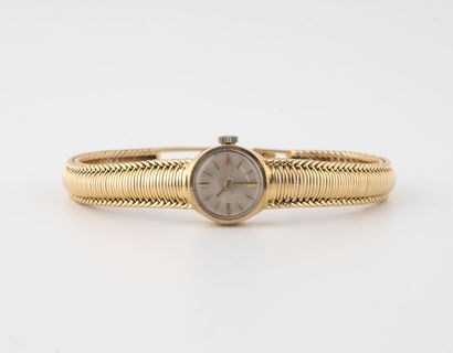 OCTO Montre bracelet dame en or jaune (750). 

Cadran à fond argenté, signé, index...