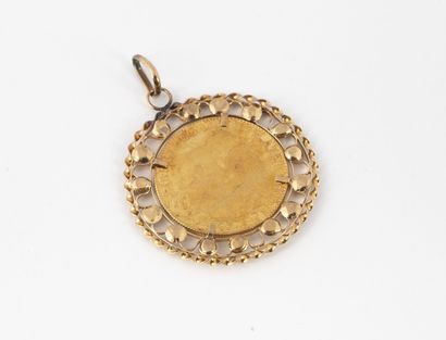 Yellow gold pendant (750) holding a 10 francs...