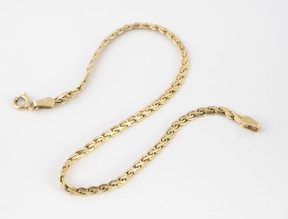 Yellow gold bracelet (750) with twisted mesh....