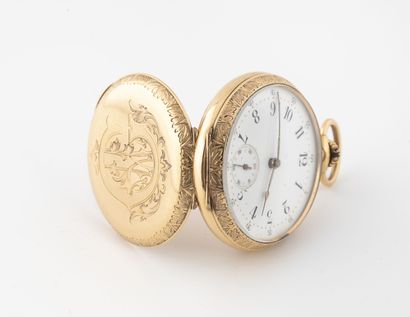 null Yellow gold (750) pocket watch.

White enamelled dial, Arabic numerals painted...