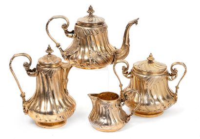 ODIOT, à Paris Service à thé et à café (4 pièces) en argent (950) doré, sur bâte...