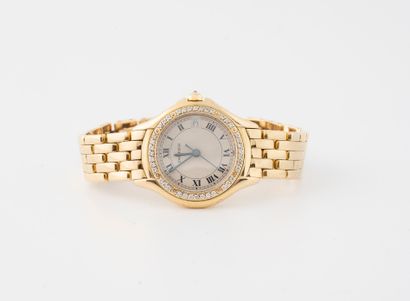 CARTIER, Paris, Cougar, vers 1992 Montre bracelet de femme en or jaune (750).
Cadran...