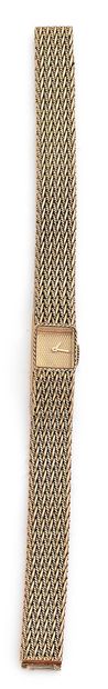 BOUCHERON, Paris Small lady's watch in braided yellow gold (750).
Rectangular case...