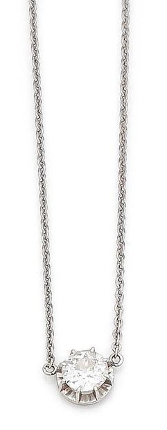 null Necklace in white gold (750) formed by a chain with forçat link centered by...